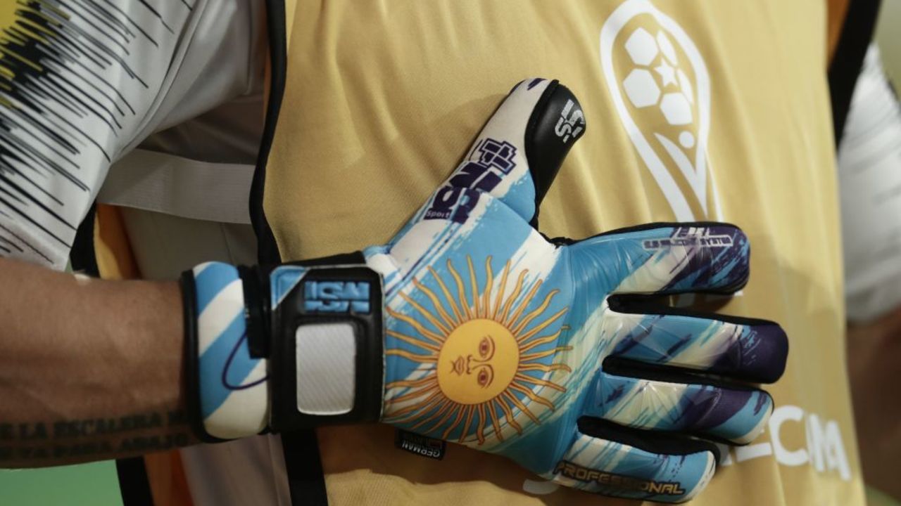 View of the gloves of Chile's Coquimbo goalkeeper Argentine Matias Cano before the start of the Copa Sudamericana semifinal football match against Argentina's Defensa y Justicia at the Norberto 'Tito' Tomaghello stadium in Florencio Varela, Buenos Aires province, Argentina, on January 16, 2021. (Photo by ALEJANDRO PAGNI / POOL / AFP)