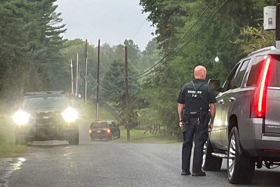 La Policía registra un área de interés en la propiedad de Longwood Gardens el jueves.