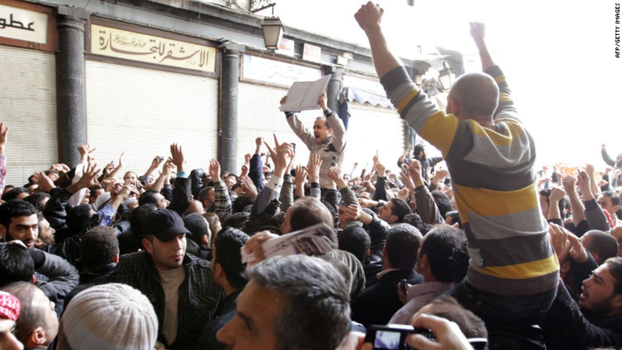 Hundreds of Syrians march from the Omayyed mosque in the centre of Damascus' Old City towards Souk Al-Hamadiyeh street on March 25, 2011 chanting: 'Daraa is Syria' and 'We will sacrifice ourselves for Syria,' as protests spread in Syria from the opposition's southern epicentre of Daraa to Damascus and a town south of the capital, where authorities moved to arrest at least five demonstrators. AFP PHOTO/STR (Photo credit should read -/AFP/Getty Images)