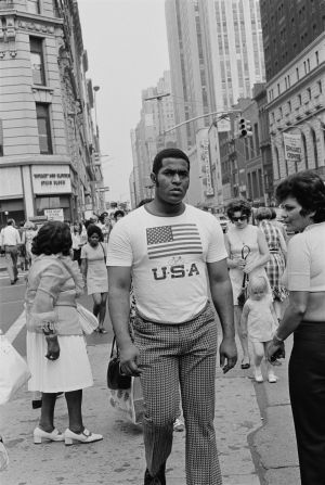 A street scene by Ernest Cole. Cole rose to fame with “House of Bondage,” his book documenting the horrors of apartheid in South Africa. The book was published in 1967, a year after he was forced to flee his motherland for the United States.