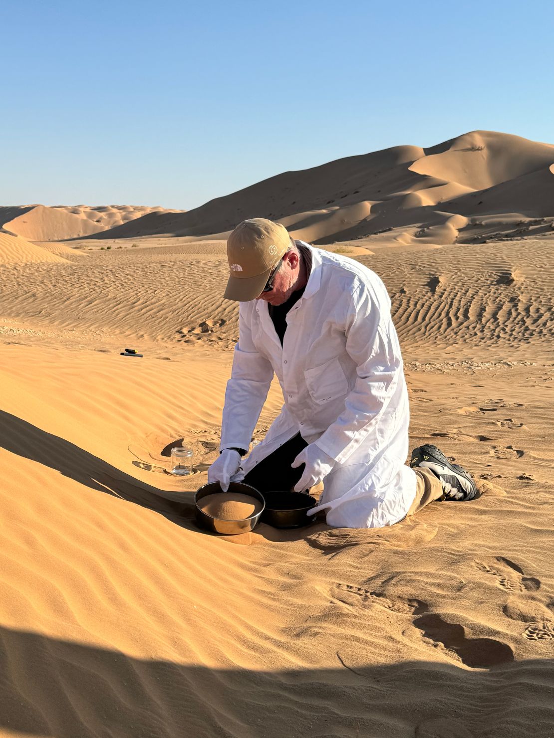 During the second leg of the mission, Chambers collected sand samples in Oman's Empty Quarter, the world's largest sand desert.