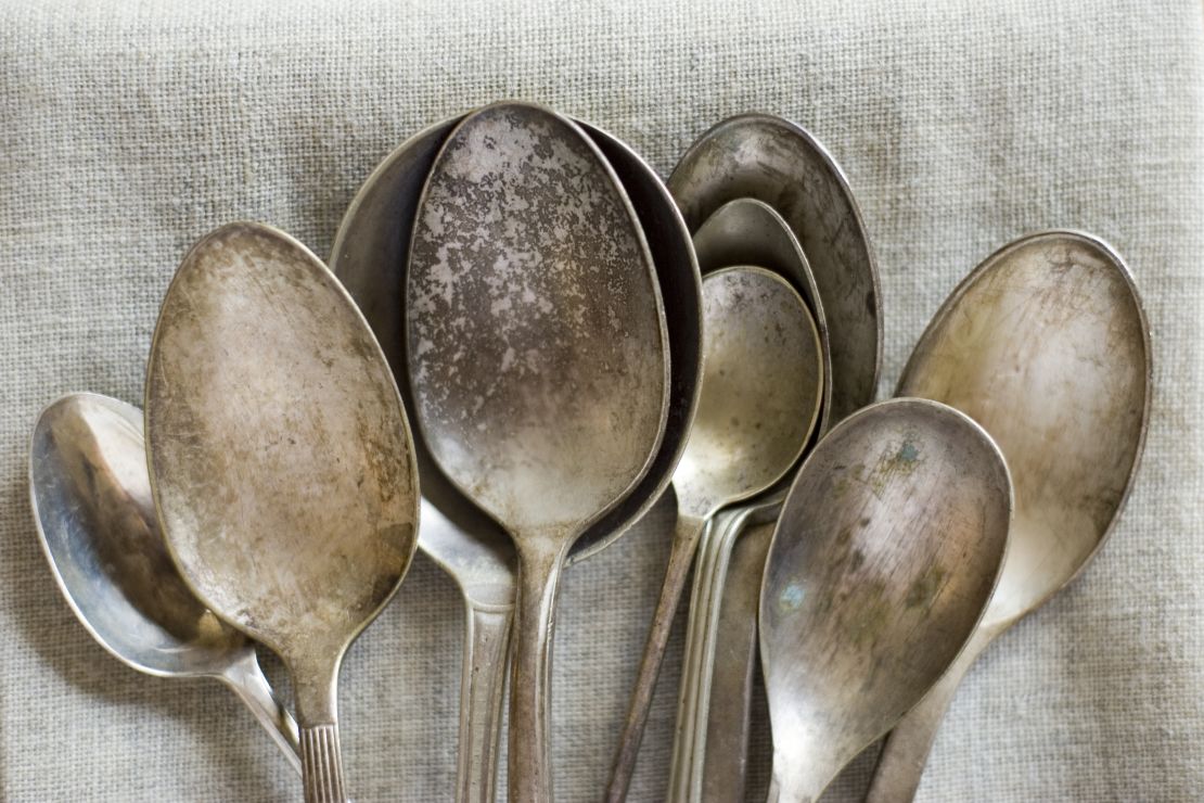 collection-of-old-spoons-tarnished-silveware-on-linen-cloth.jpg