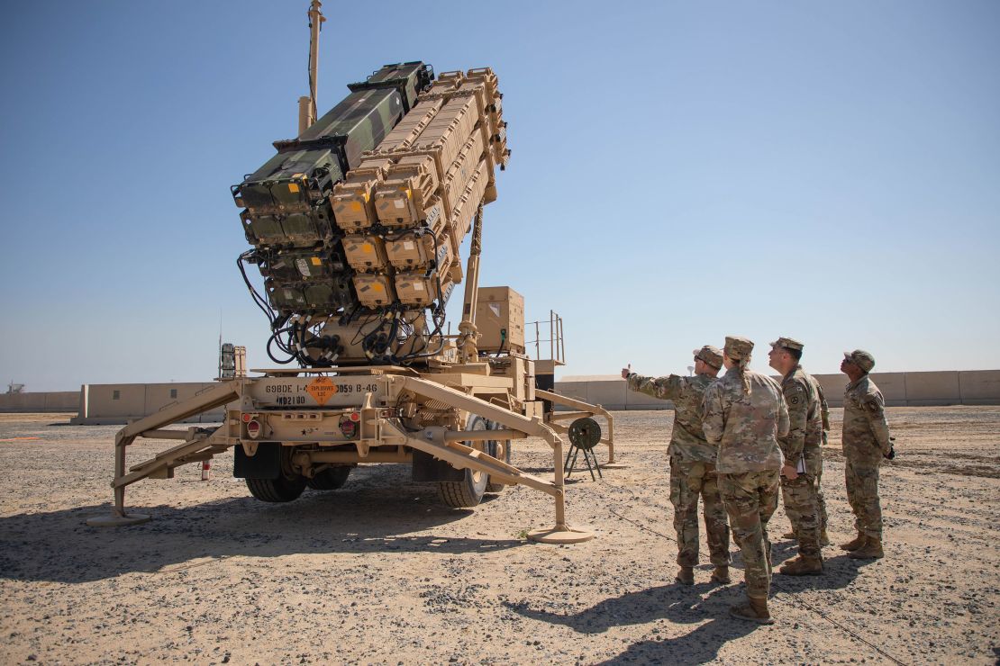 A US Army commander discusses Patriot battery readiness with soldiers assigned to an Air Defense Artillery Regiment on February 19.