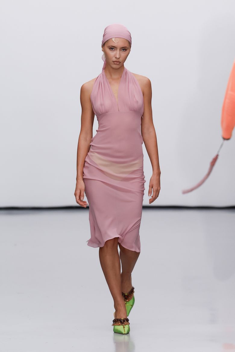 Iris Law walked the Conner Ives show, which was built around neon colors.