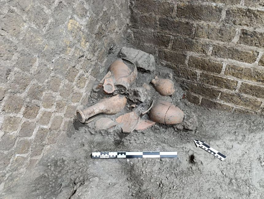 A pile of ceramic containers, fragments, tiles and marble found that were reused by occupants after AD 79.