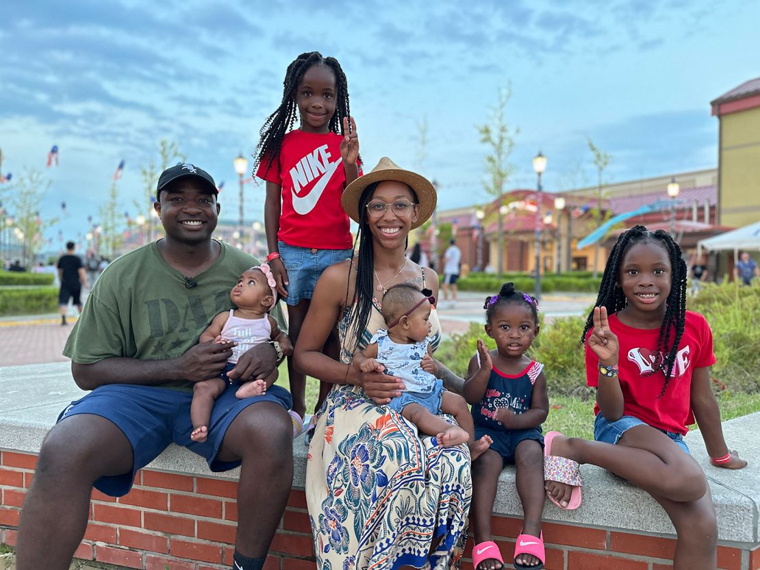 US Army Sgt. Terry Cook and his wife, Tyrese, pose with their five children at Camp Humphreys, July 4, 2024.