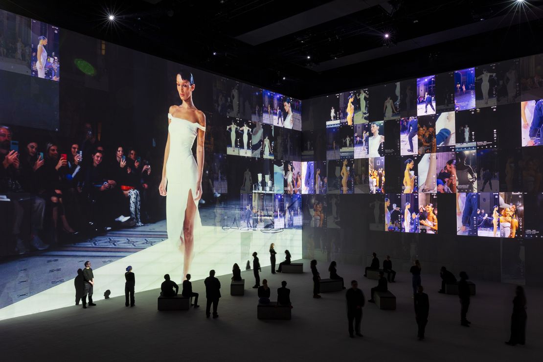 The Vogue exhibition at the Lightroom chronicles the history of the runway, using backstage and runway footage to immerse the audience.