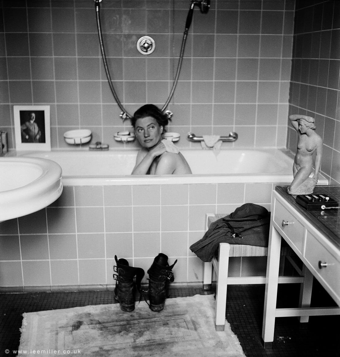 This portrait of Miller in Hitler's bathtub in Munich on the day of his death — her boots dirtying his bathmat — has become one of the images for which she is most known.