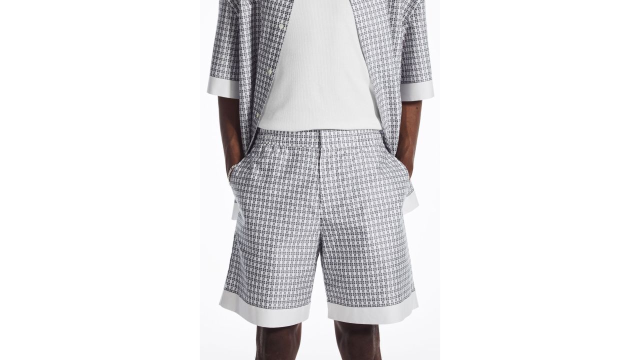 Man wearing printed shorts from COS