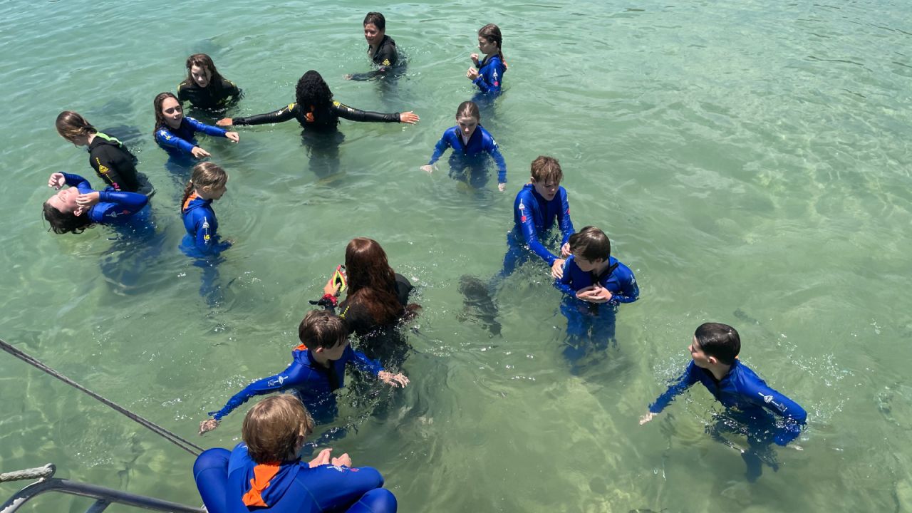In the warm waters off the coast of Queensland, Australia, students at Belgian Gardens State School learn about the amazing coral environment on their doorstep for Call to Earth Day 2022.