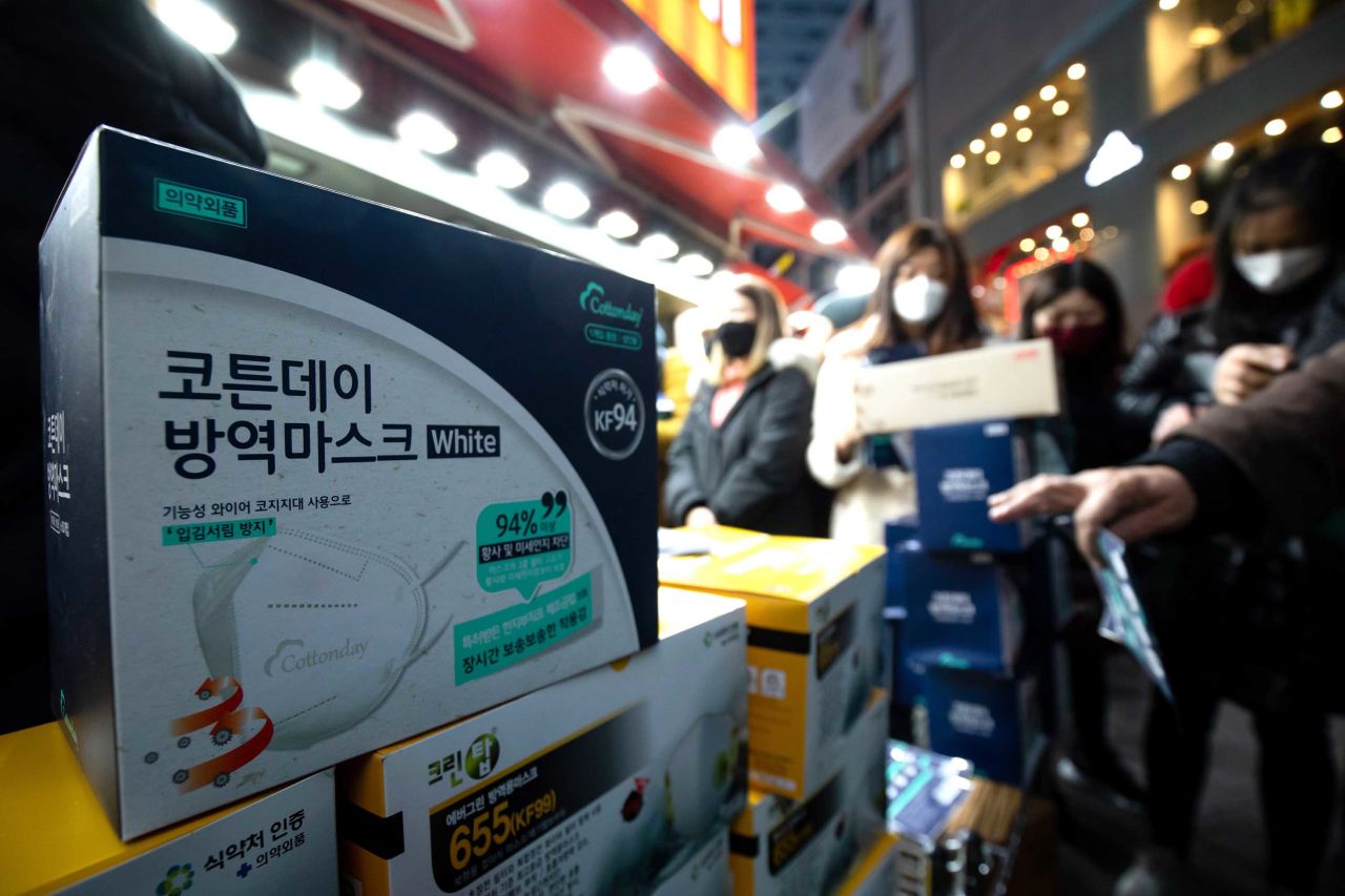 Boxes of protective masks are displayed for sale outside a supermarket in Seoul, South Korea, on Monday.