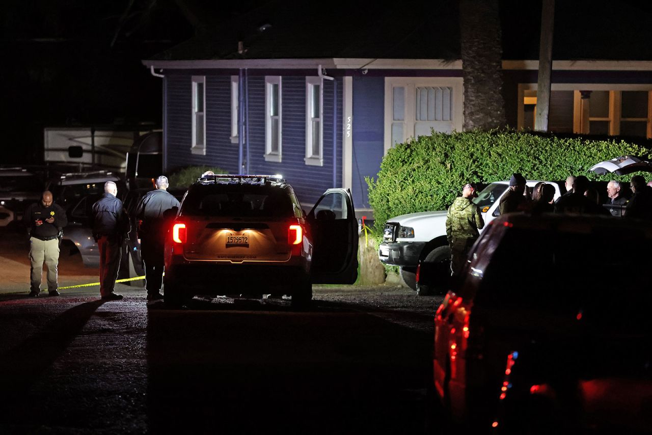 Law enforcement officials investigate a property following a mass shooting on January 23 in Half Moon Bay, California. 