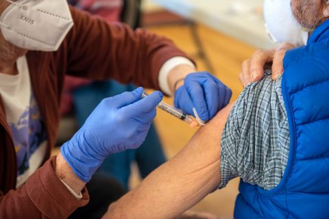 A nurse administers a Covid-19 vaccine to a patient at the Park County Health Department on January 28, in Livingston, Montana. 