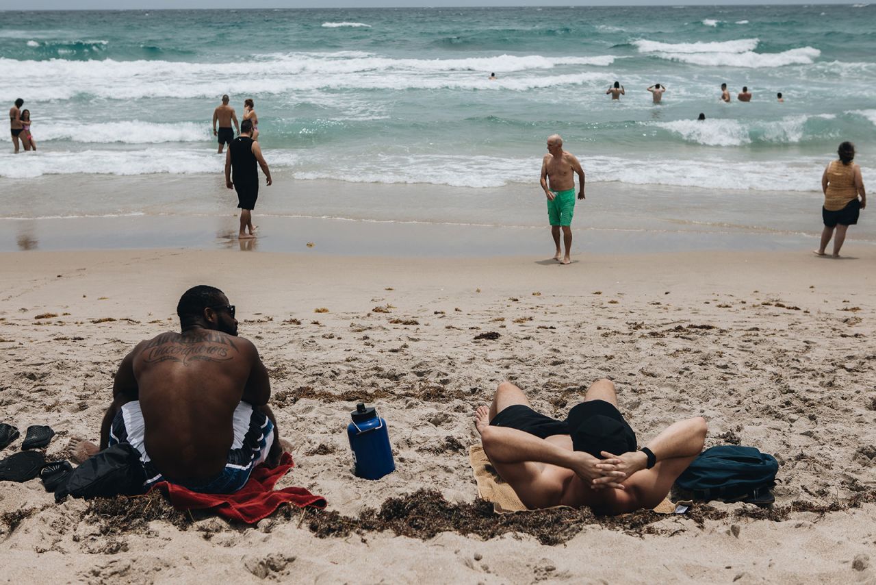People gather at a beach in Delray Beach, Florida, on May 23.