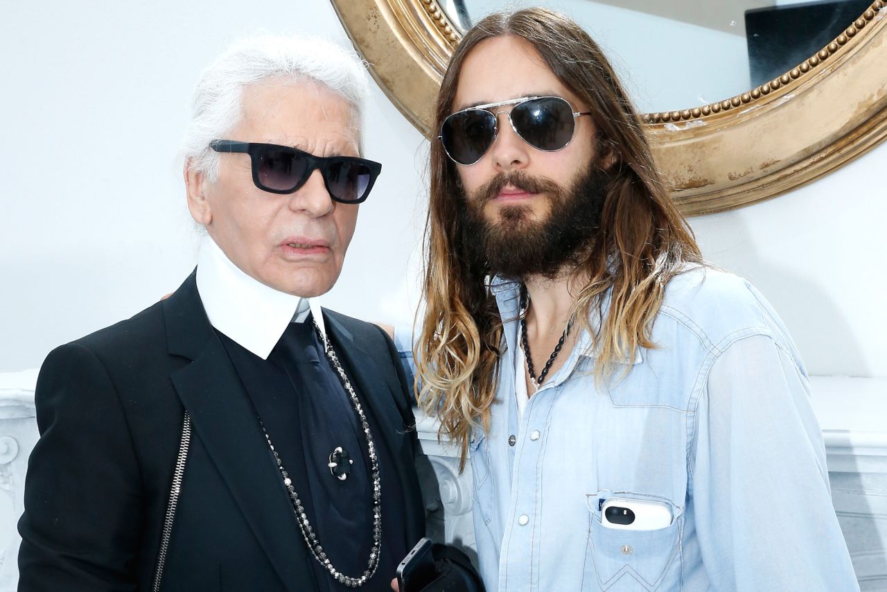 Karl Lagerfeld and Jared Leto pose backstage after Chanel's Fall-Winter 2014 Haute Couture Show in Paris on July 8, 2014.