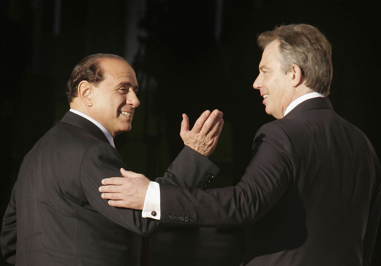 Silvio Berlusconi is welcomed by Tony Blair in London in October 2005. At the time they were both serving as prime minister of their respective countries.