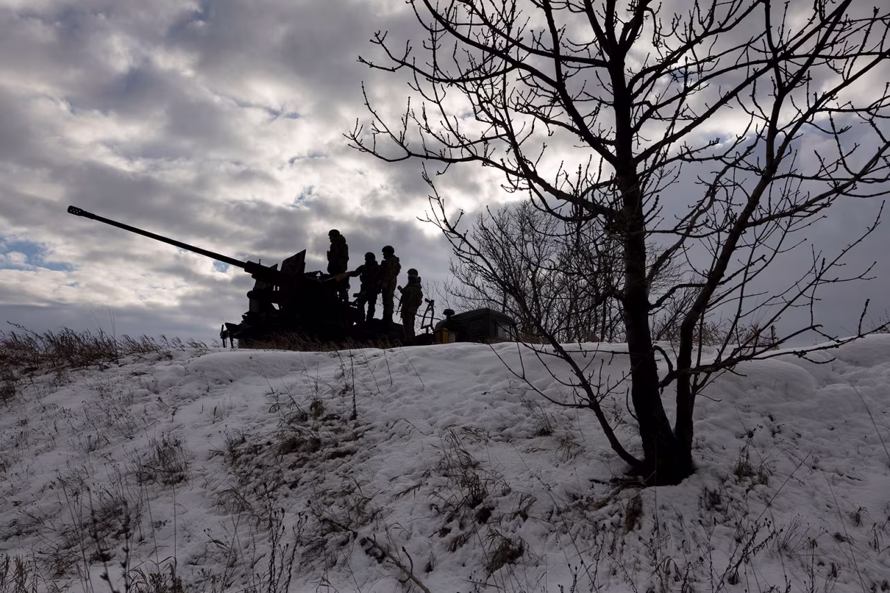 Ukrainian soldiers look towards Russian positions on February 14 near Bakhmut, Ukraine. 