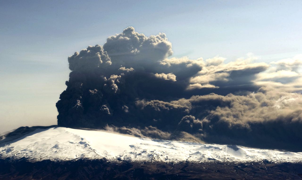 An aerial photo shows the Eyjafjallaj?kull volcano billowing smoke and ash on April 17, 2010. 