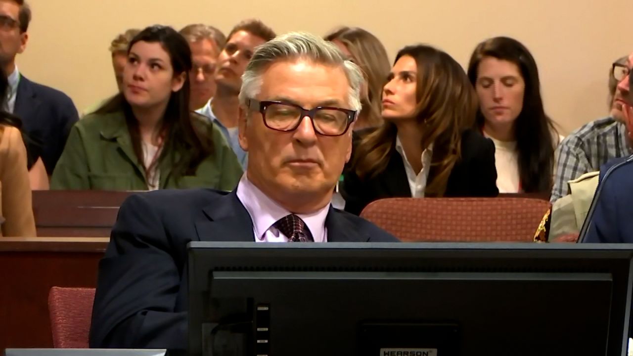 Alec Baldwin looks at a screen as gun evidence is being shown in court on Wednesday. 