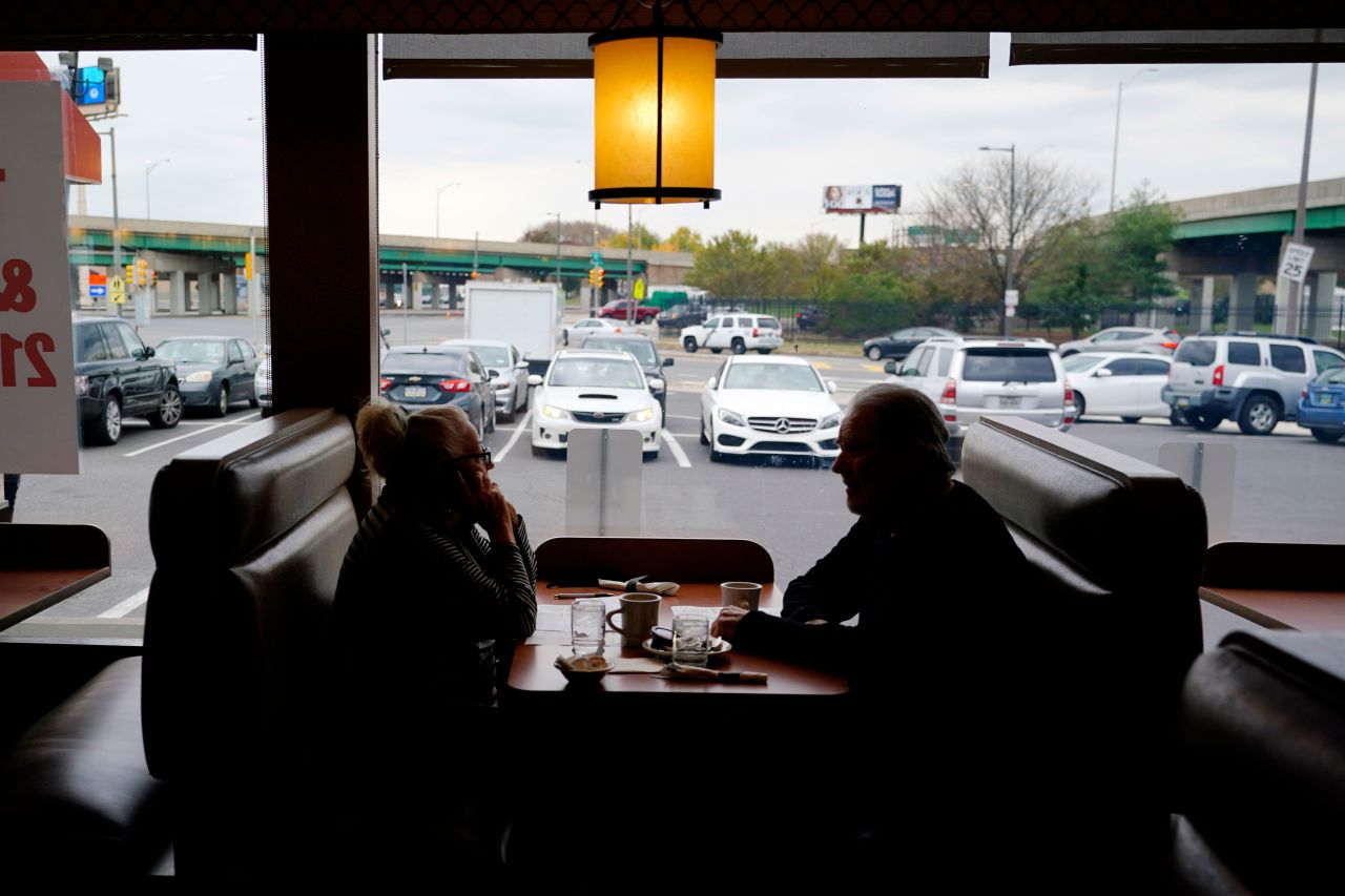 Customers sit in a booth at the Penrose Diner, on Tuesday, November 17, in south Philadelphia.