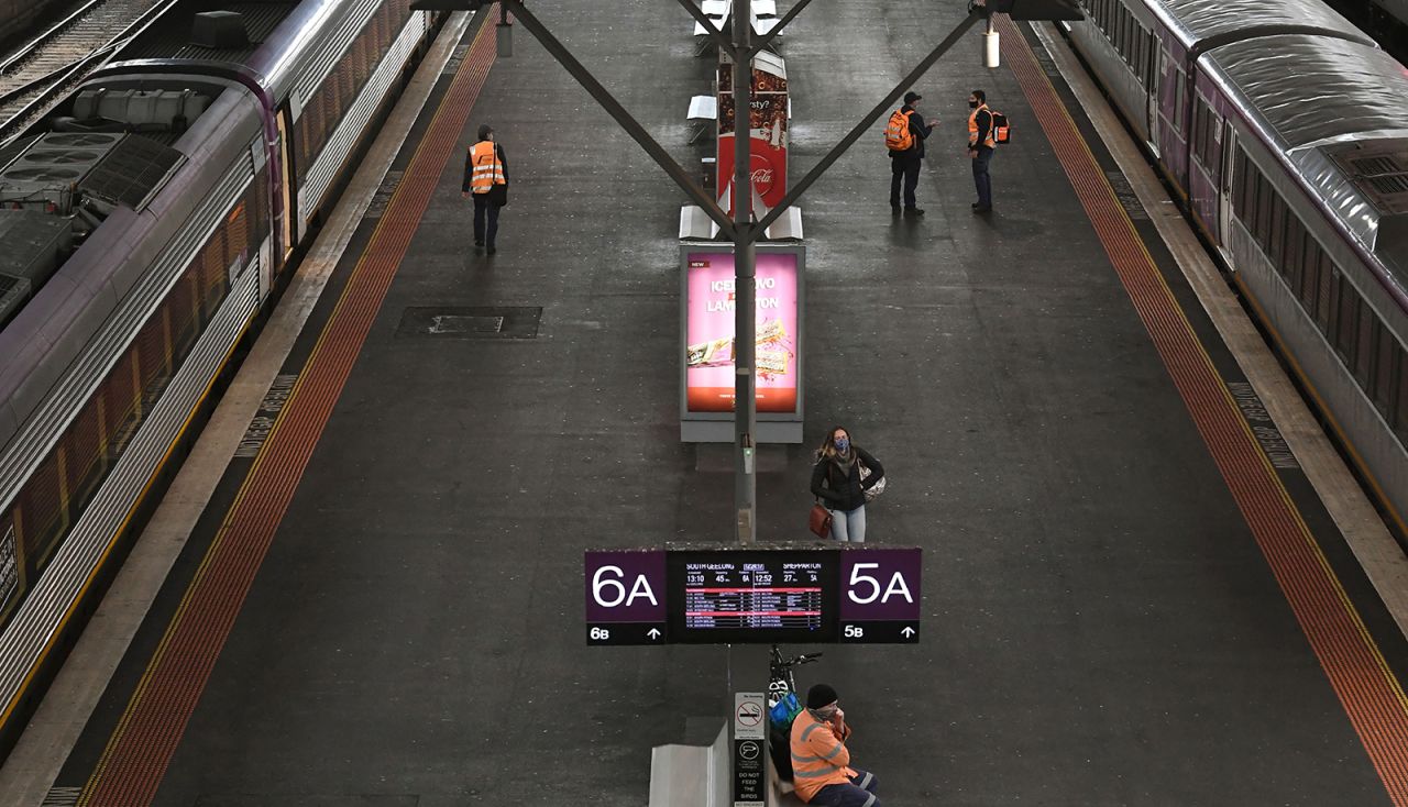 A lone passenger walks along a platform at Southern Cross Station in Melbourne, Australia on August 7.
