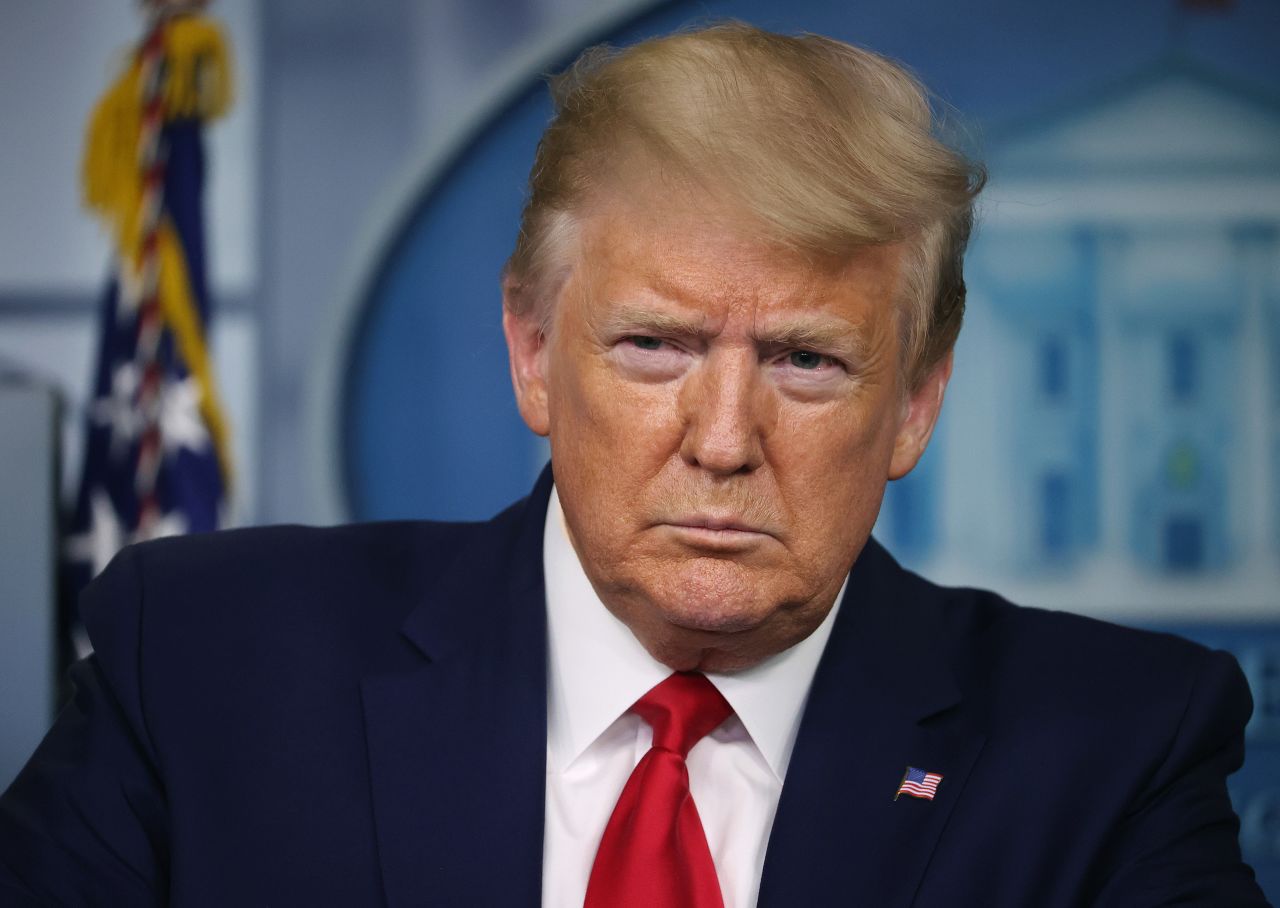 President Donald Trump listens to questions from reporters following a meeting of his coronavirus task force at the White House on April 6.