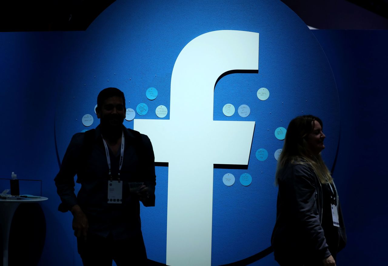 The Facebook logo is displayed at the F8 Facebook Developers conference in San Jose, California on April 30.