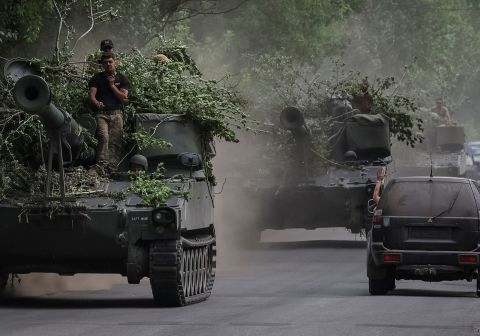 Ukrainian servicemen ride American 155 mm turreted self-propelled howitzers M109 in the Donetsk region, Ukraine, on June 13.
