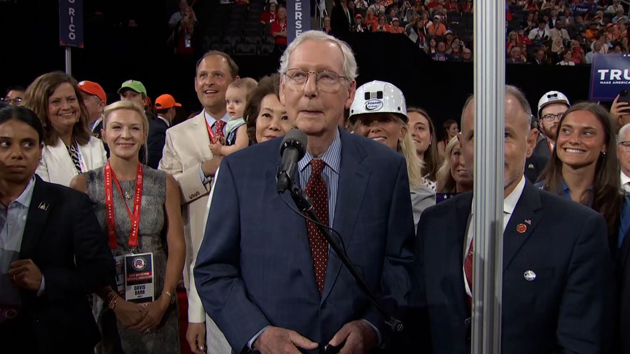 Senate Minority Leader Mitch McConnell takes the mic with the Kentucky delegation.