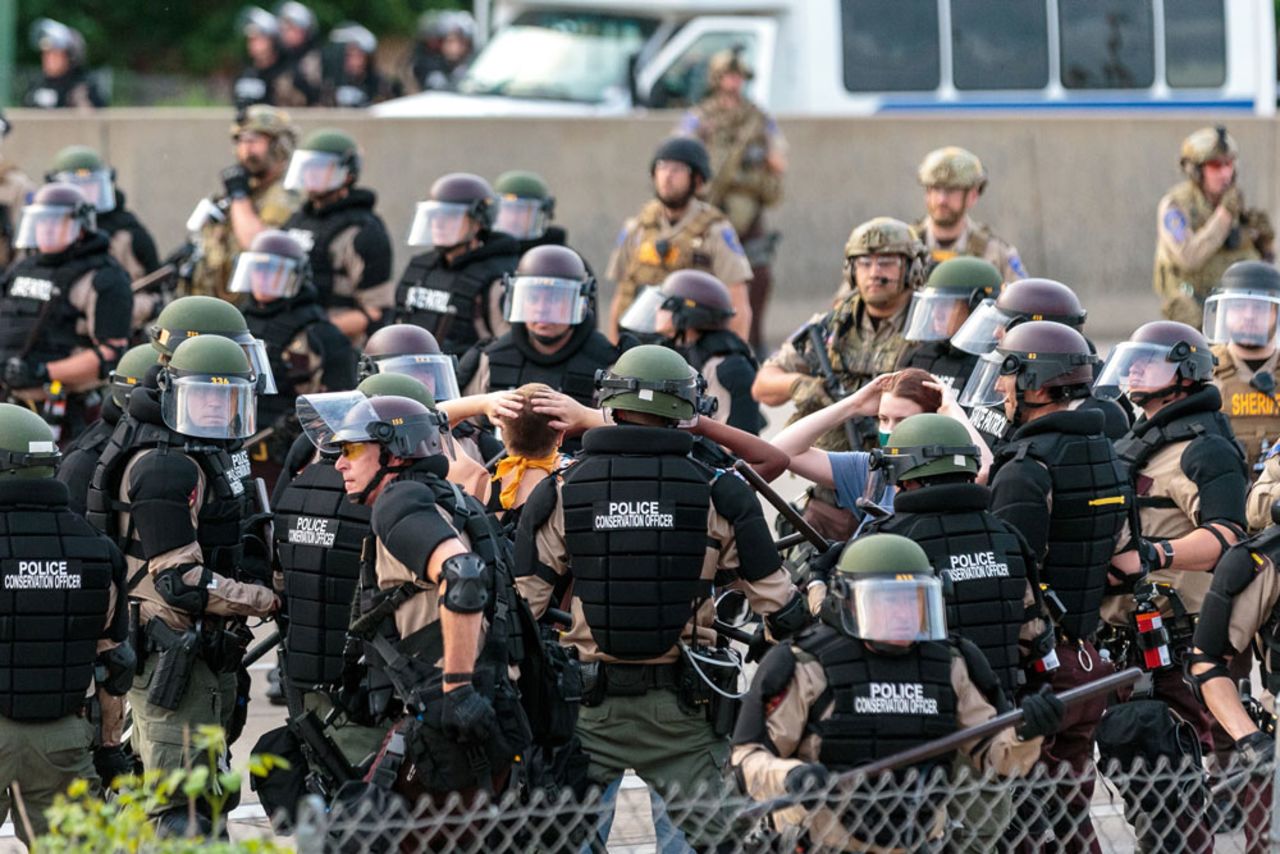 Police surround protesters as they arrested on May 31, in Minneapolis during a protest against the death of George Floyd.