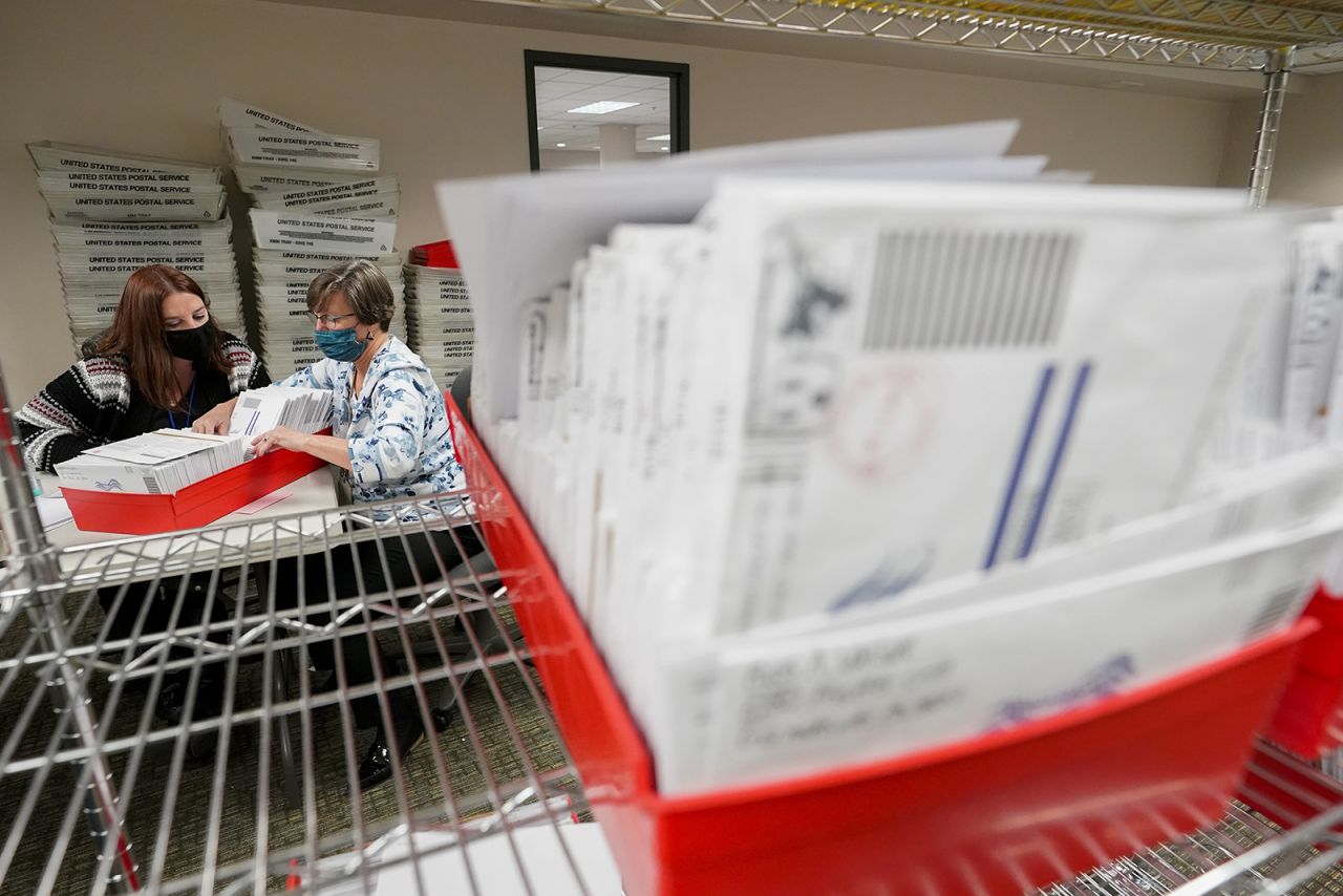 Lehigh County workers count ballots as vote counting in the general election continues on Thursday, November 5, in Allentown, Pennsylvania. 