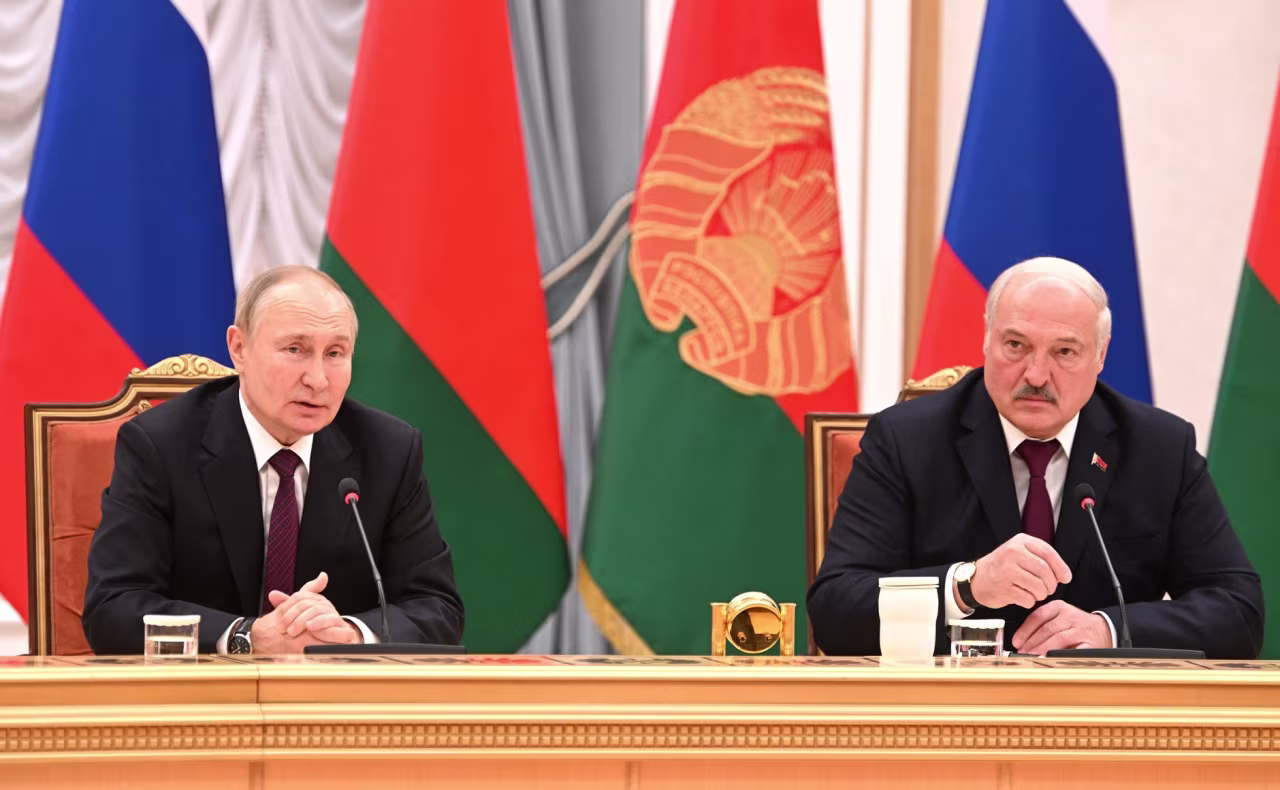 Russian President Vladimir Putin, left, and Belarusian President Alexander Lukashenko meet at the Palace of Independence in Minsk, Belarus, on December 19.