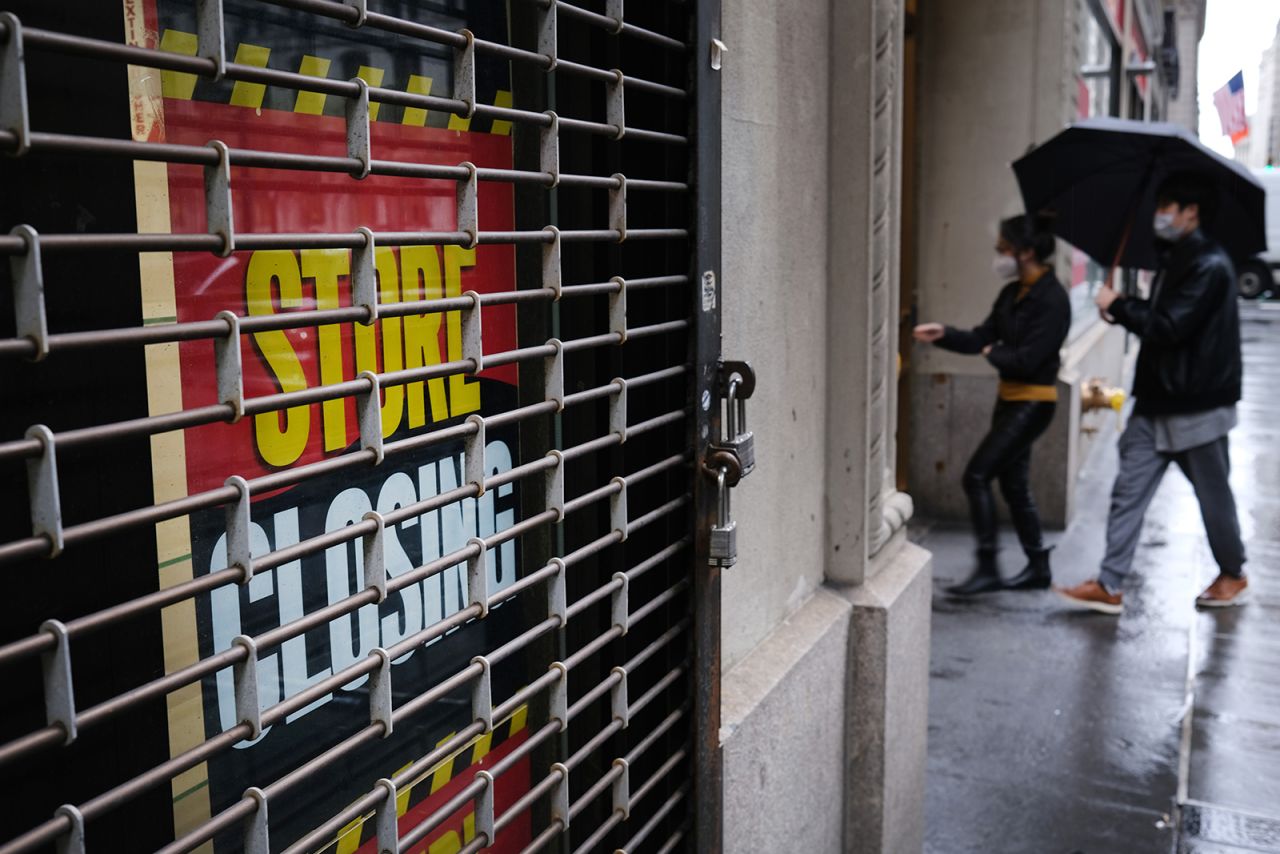 A store remains closed near Wall Street on May 8, in New York City. 