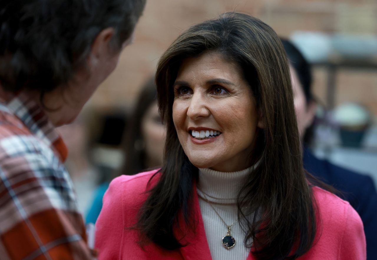 Republican presidential candidate former U.N. Ambassador Nikki Haley interacts with people during a campaign stop at The Bread Board on January 15, in Pella, Iowa.