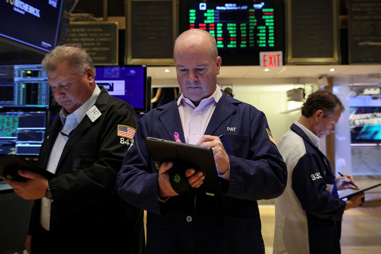 Traders work on the floor of the New York Stock Exchange in New York on November 7.