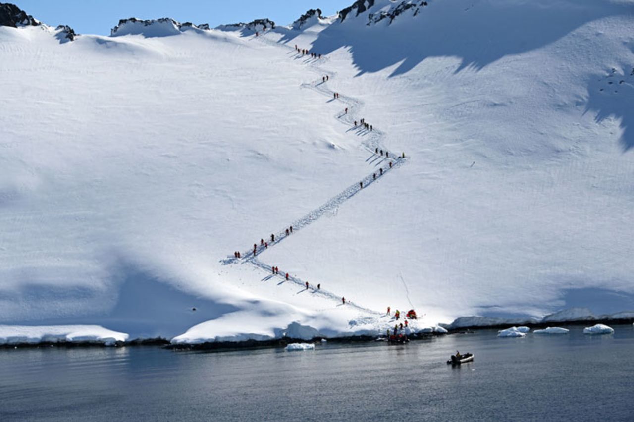 Tourists visit Orne Harbor in South Shetland Islands, Antarctica on November 8, 2019.