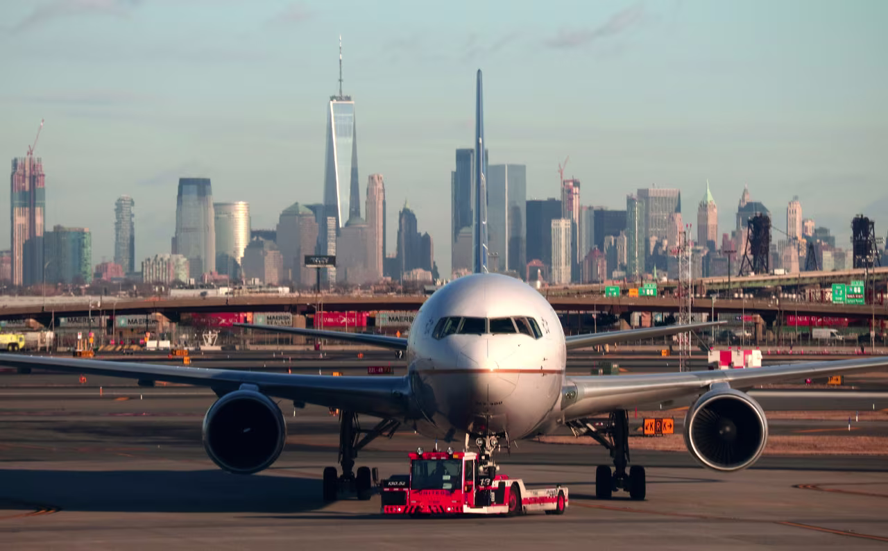 A plane is towed to a gate at Newark Liberty International Airport on January 21.