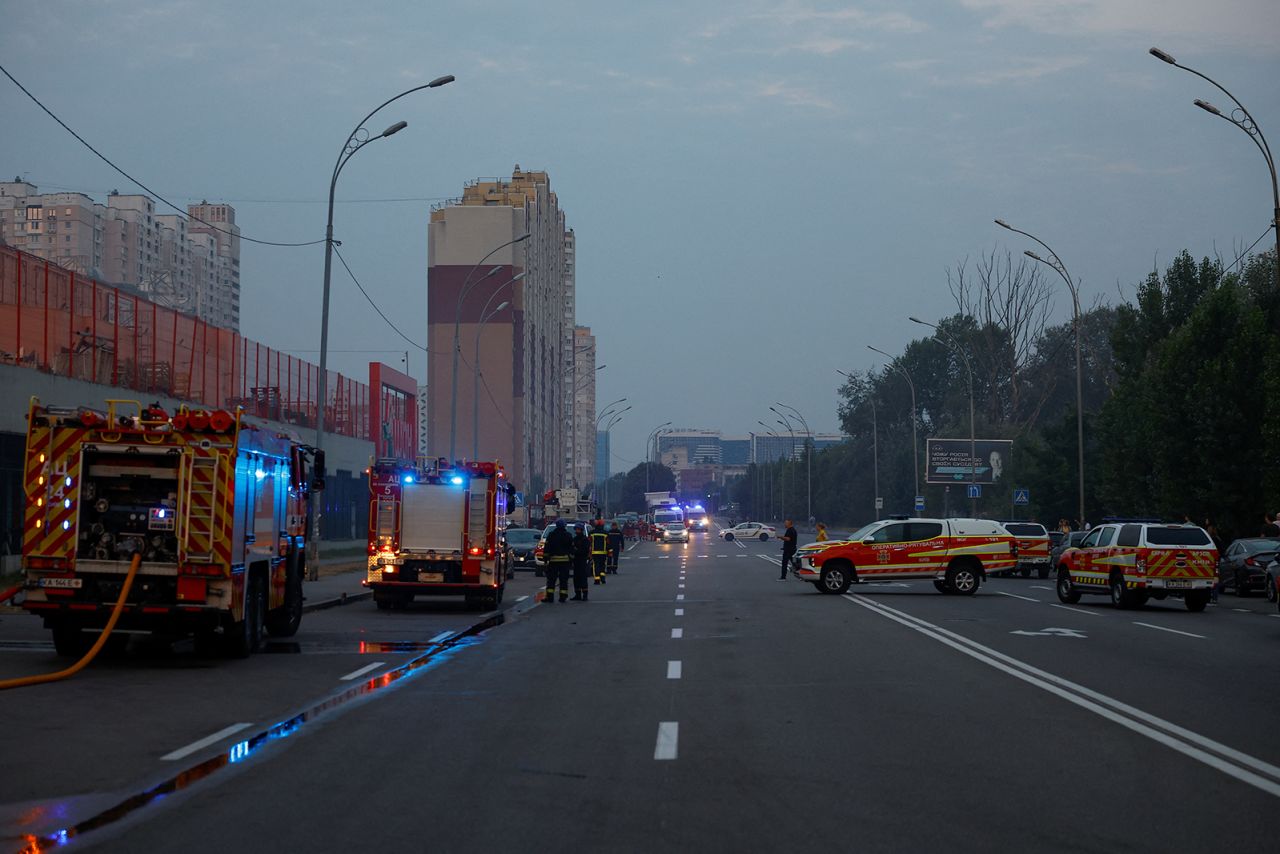 Emergency vehicles are seen at a site of a shopping mall damaged during a Russian missile strike in Kyiv, Ukraine on August 30.