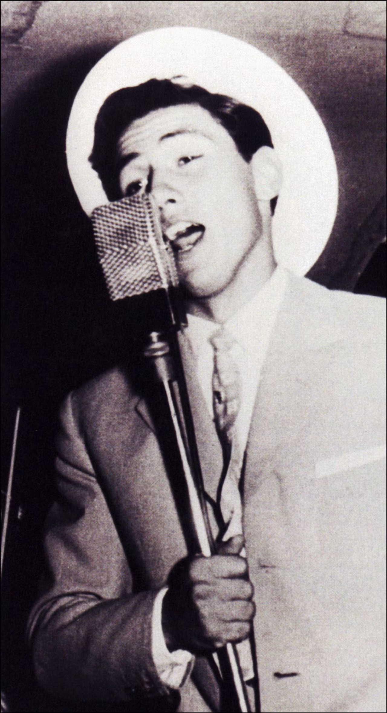 An image from Berlusconi's book "Una storia italiana" shows him during his early singing career. Berlusconi sent copies of the book to Italian voters ahead of the 2001 election.