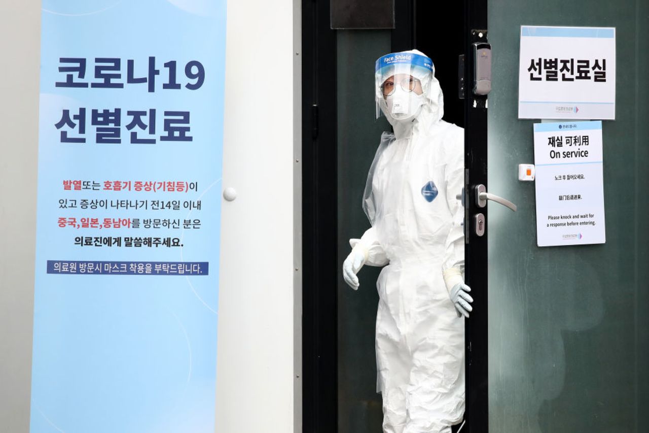 A medical worker is seen at a preliminary testing facility for coronavirus on February 21, 2020 in Seoul, South Korea.