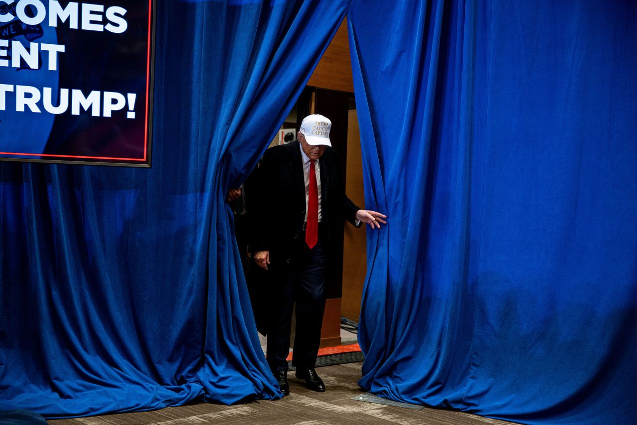 Former US President Donald Trump arrives for a campaign event in Indianola, Iowa, on January 14.