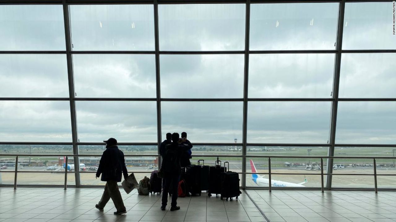 Passengers wait to board flights, amidst the spread of the new SARS-CoV-2 variant, at O.R. Tambo International Airport in Johannesburg, South Africa, November 27, 2021.?