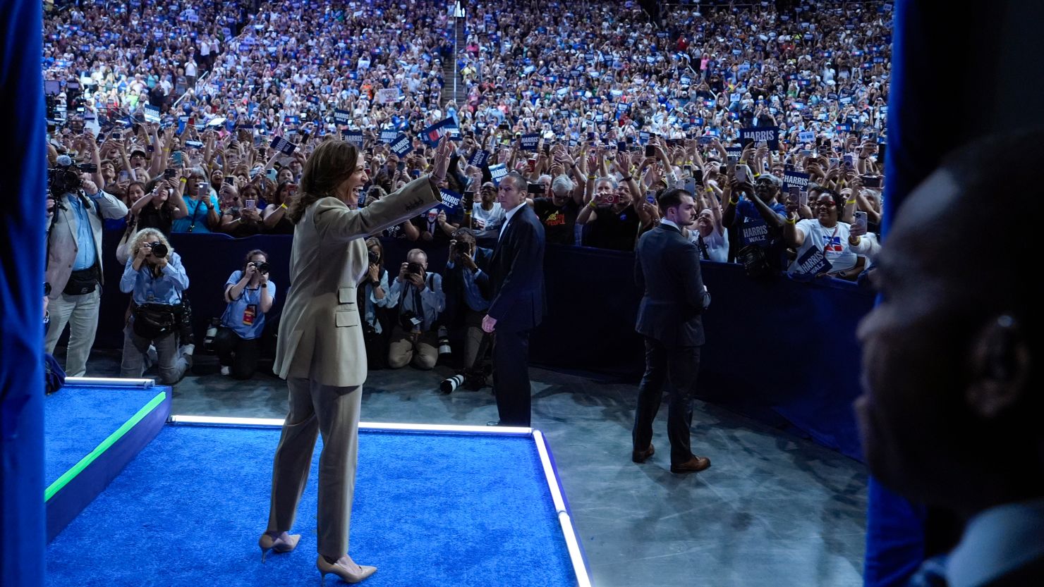 Kamala Harris arrives as she is introduced by running mate Minnesota Gov. Tim Walz at a campaign rally in Glendale, Arizona, on August 9.