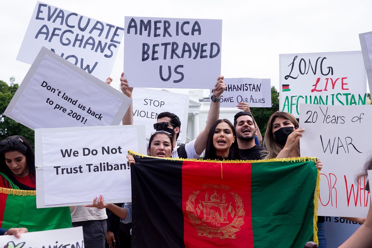 People protest in support of Afghanistan and against the Taliban take over of the country, at Lafayette Square across the street from the White House in Washington DC on August 15.