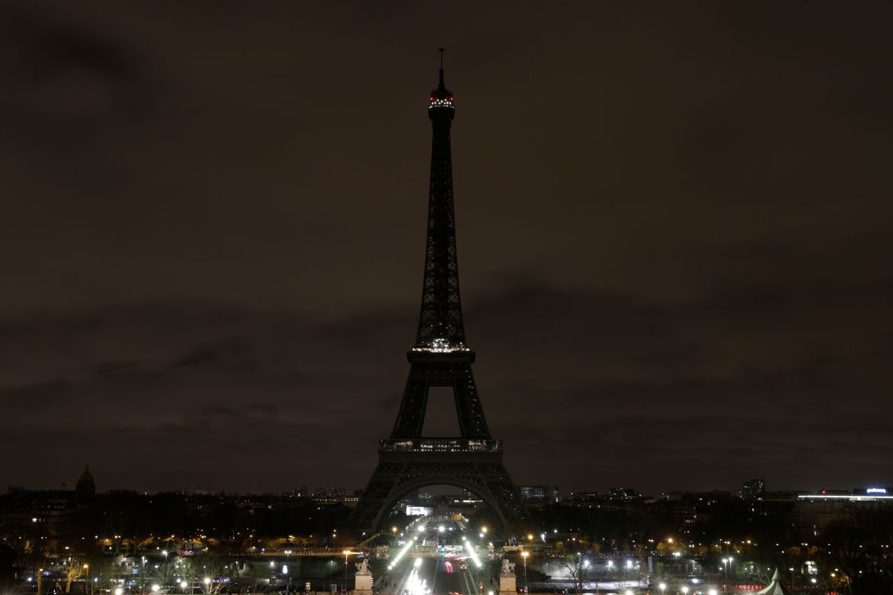 The Eiffel Tower in Paris goes dark on Friday evening