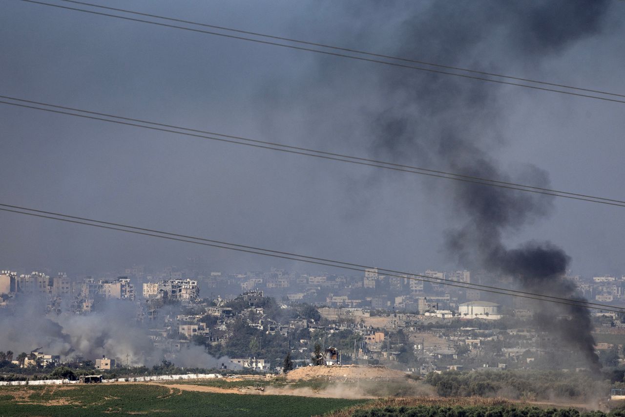 Smoke billows across the skyline of Gaza on October 31.