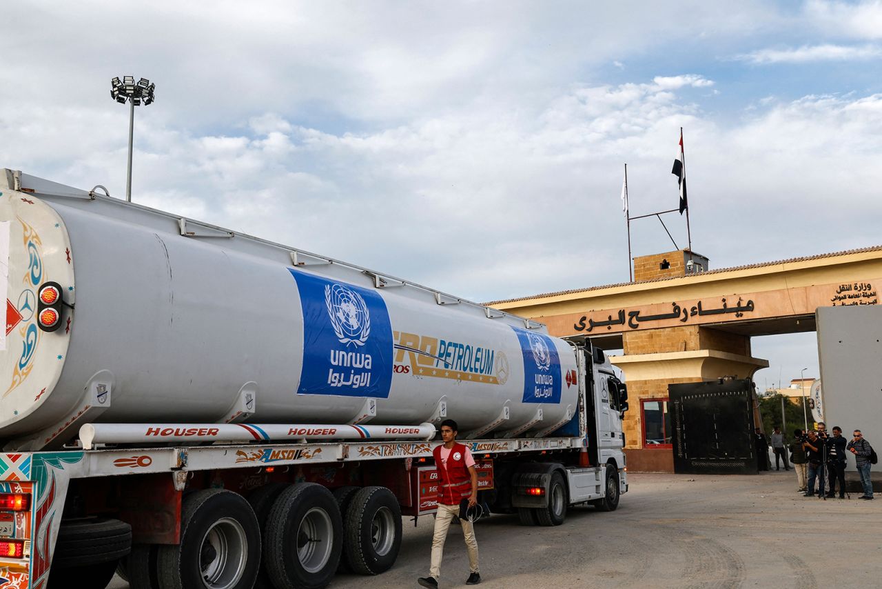 A truck of the United Nations Relief and Works Agency for Palestine Refugees (UNRWA) carrying fuel arrives at the Egyptian side of the Rafah border crossing with the Gaza Strip on November 22. 