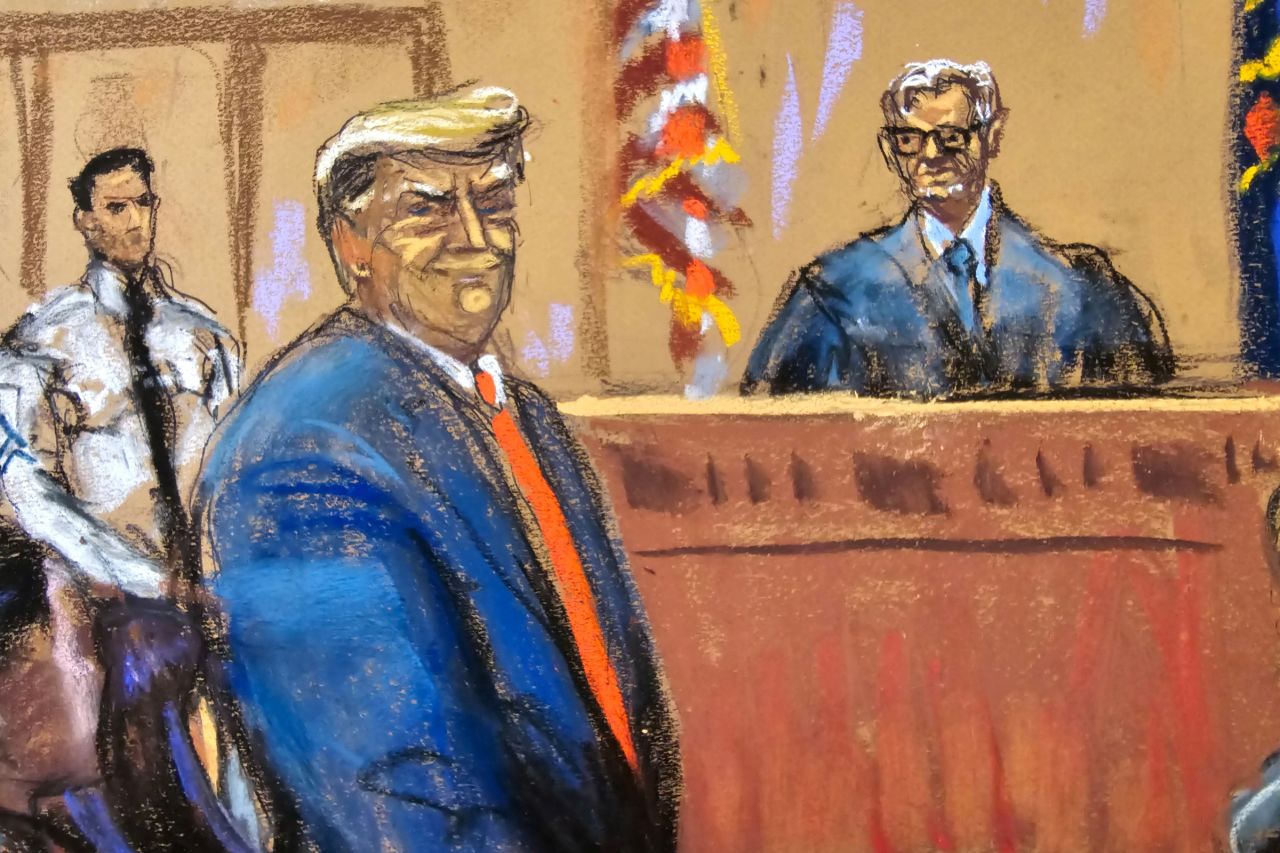 Former President Donald Trump smiles to the jury pool as he is introduced to them, at the beginning of his trial before Justice Juan Merchan over charges that he falsified business records to conceal money paid to silence porn star Stormy Daniels in 2016, in Manhattan state court in New York City, on April 15.