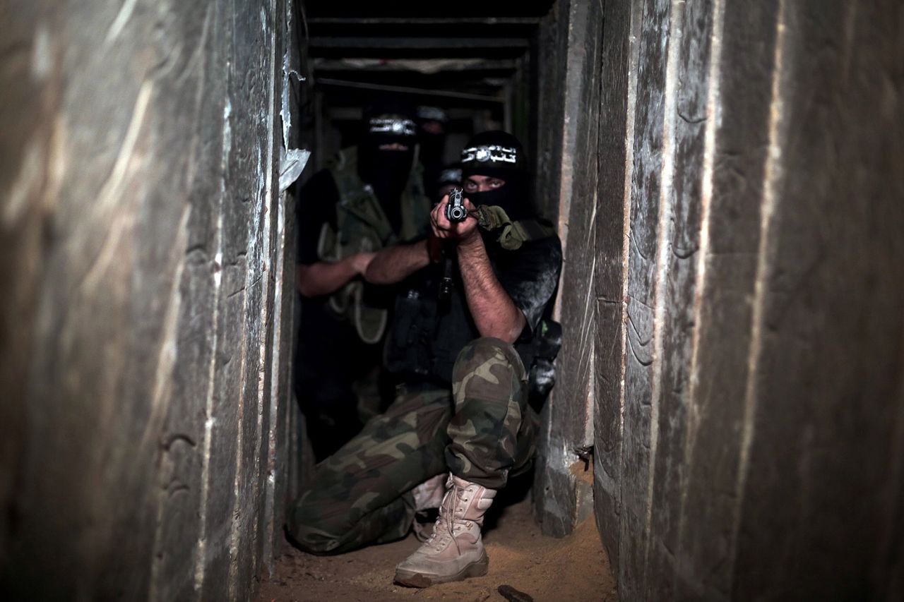 Armed Izz ad-Din al-Qassam Brigades, military wing of Hamas, deploy at a tunnel in Shujaya neighborhood of Gaza City, Gaza, on August 17, 2014. 