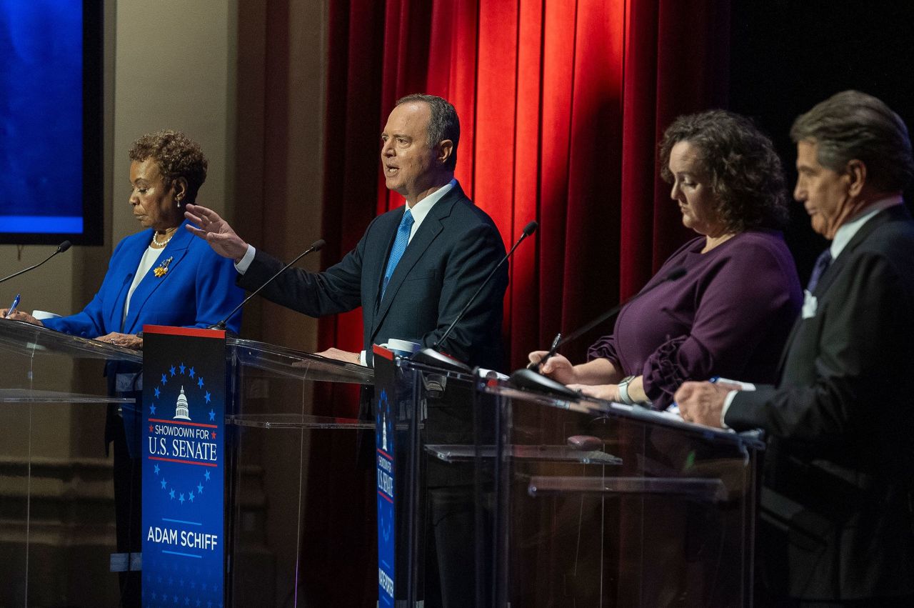 From left: Rep. Barbara Lee, Rep. Adam Schiff, Rep. Katie Porter, and former baseball player Steve Garvey stand on stage in Los Angeles during a televised debate for candidates in the senate race to succeed the late California Sen. Dianne Feinstein on January 22.